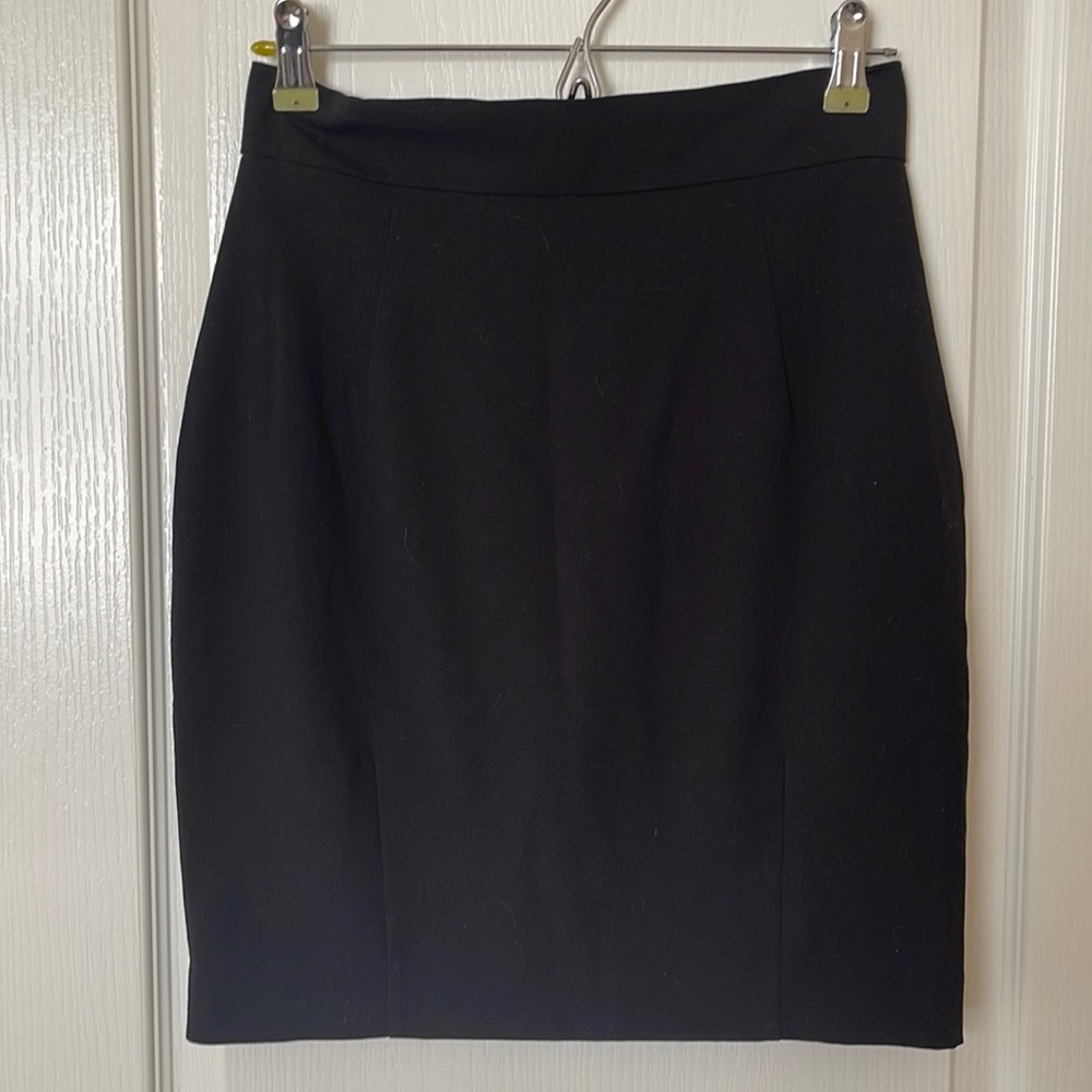 Mid length black skirt